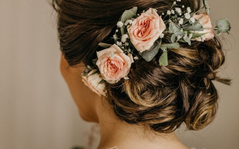 Elegant bridal hairstyle updo adorned with flowers